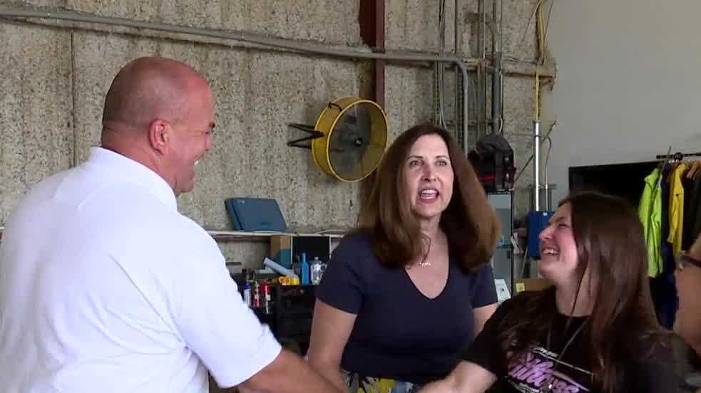 Firefighter reunites with woman, daughter at graduation party after re